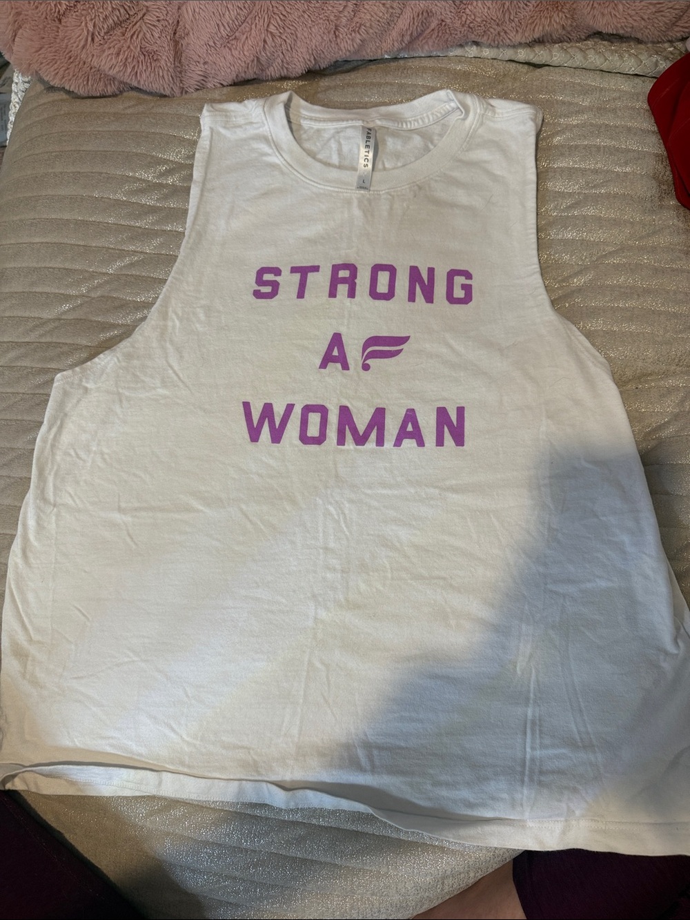 Fabletics White Muscle Tank with Purple 'STRONG A WOMAN' Graphic